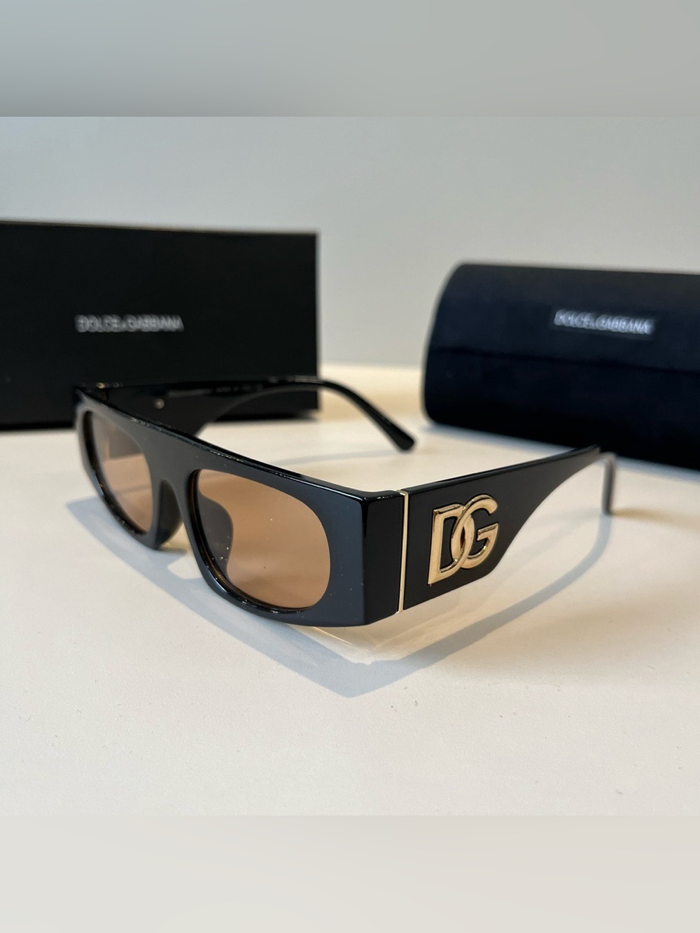 Dolce & Gabbana Black Frame Sunglasses with Gold DG Logo and Brown Lenses